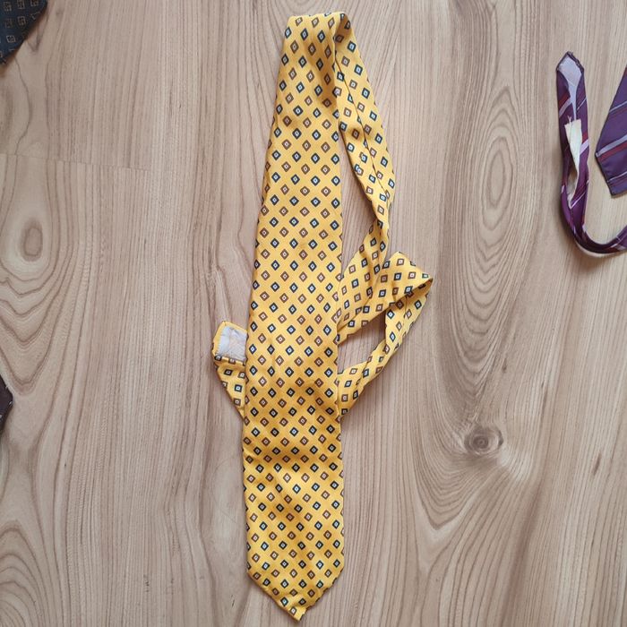 Żółty w kostkę vintage krawat
Stan bardzo dobry
