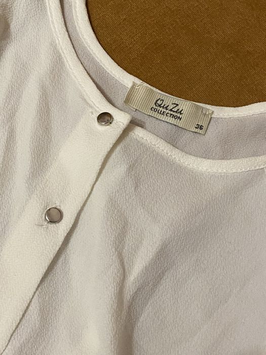 Вклрочена блуза.