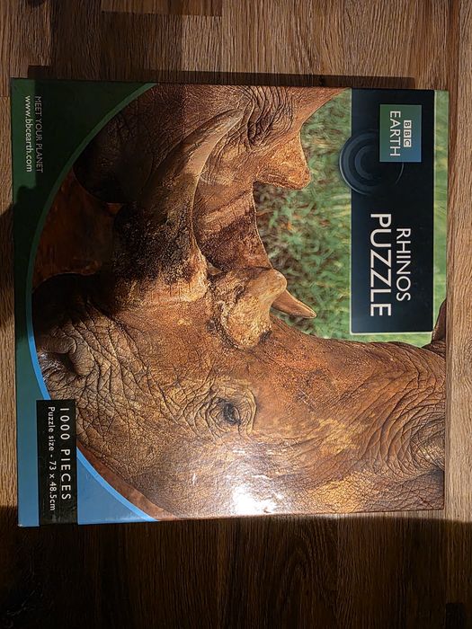 Puzzle BBC Earth 1000 elementów Nosorożce