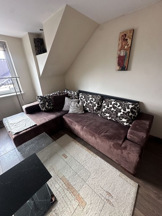 Rogowka rozkladana kanapa sofa funkcja spania poduszki