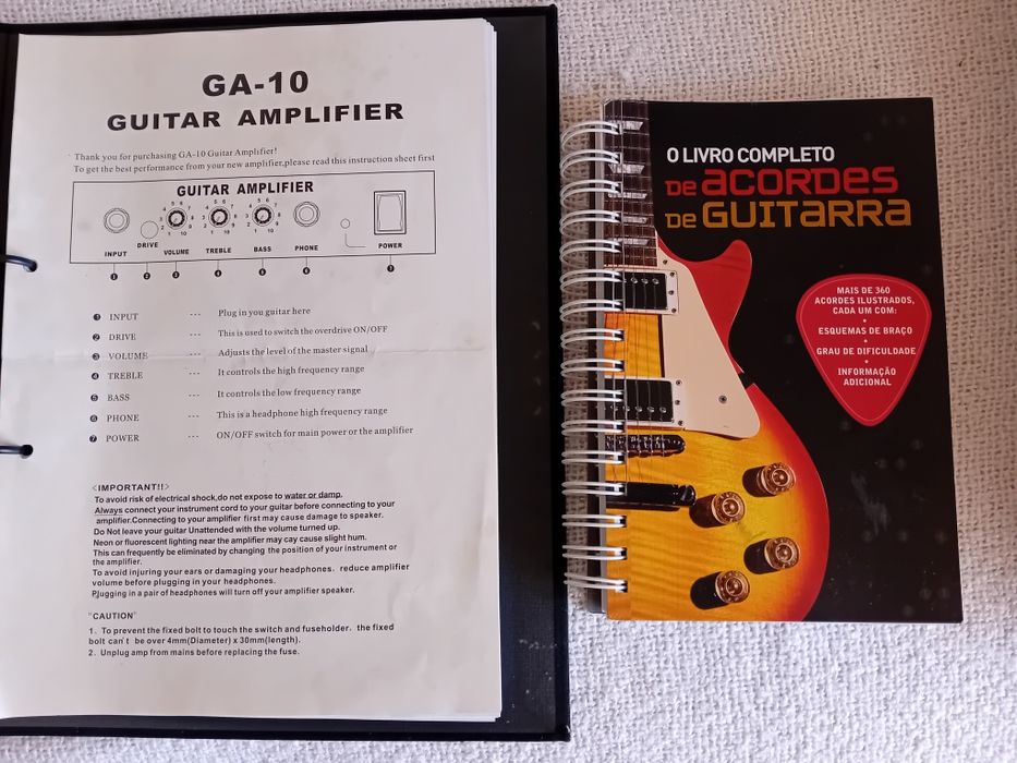 Guitarra e amplificador, novos a estrear. Inclui: suporte parede, saco/estojo, cordas, palhetas, instruções, livro de acordes.