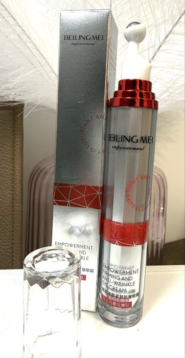 Krem pod oczy z metalowa kulka do masazu