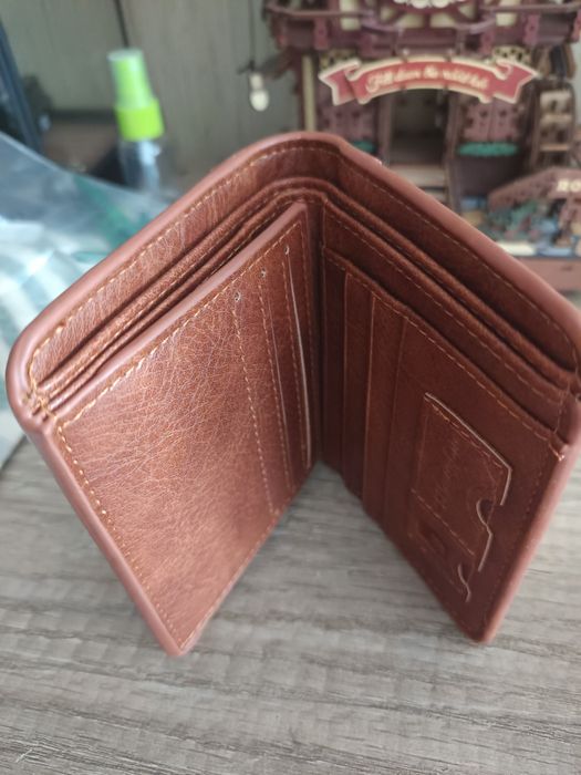 Vendo carteira nova para homem castanho bom estado