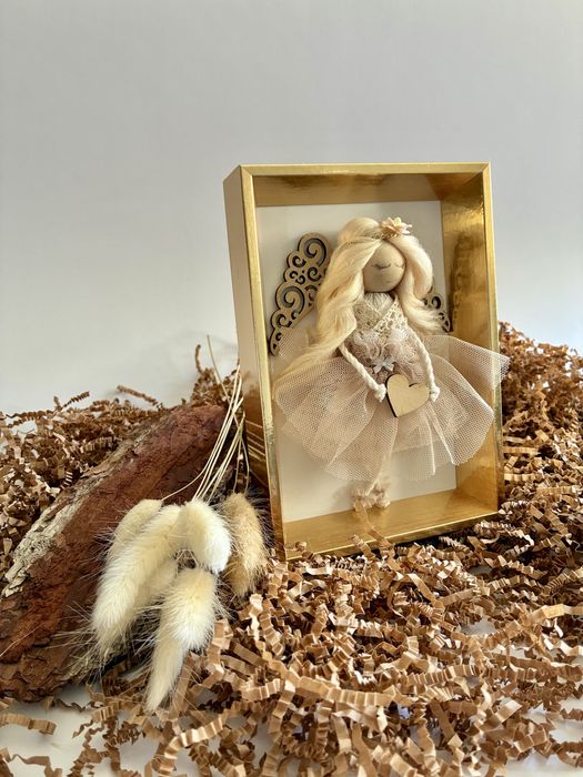 Aniołek w złotej ramce