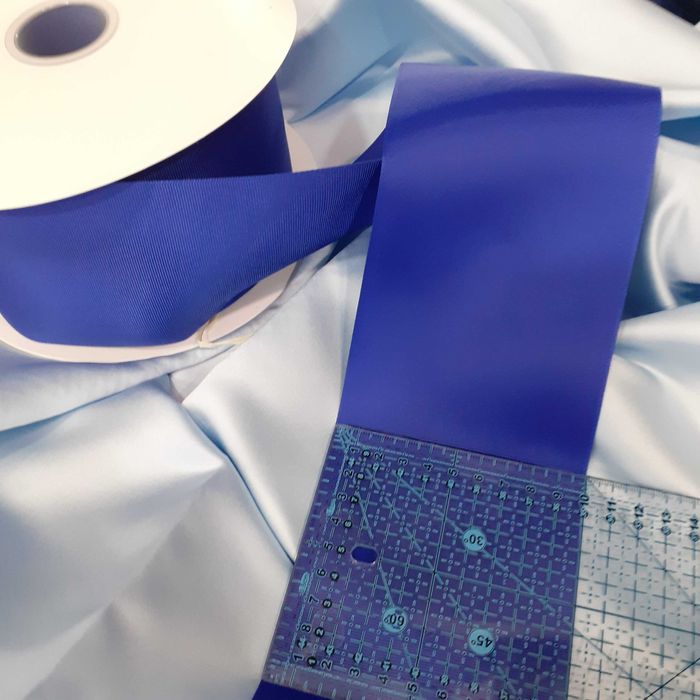 Fita 11cm.largura , cor Arco Iris, branco e azul  de gorgorão