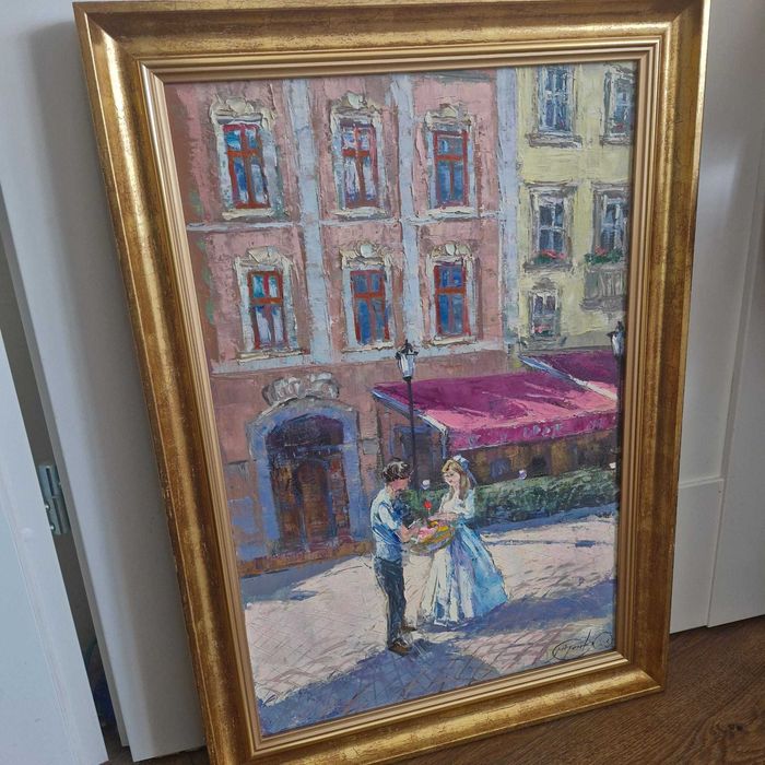 obraz ręcznie malowany, para na tle kamieniczek w ramie