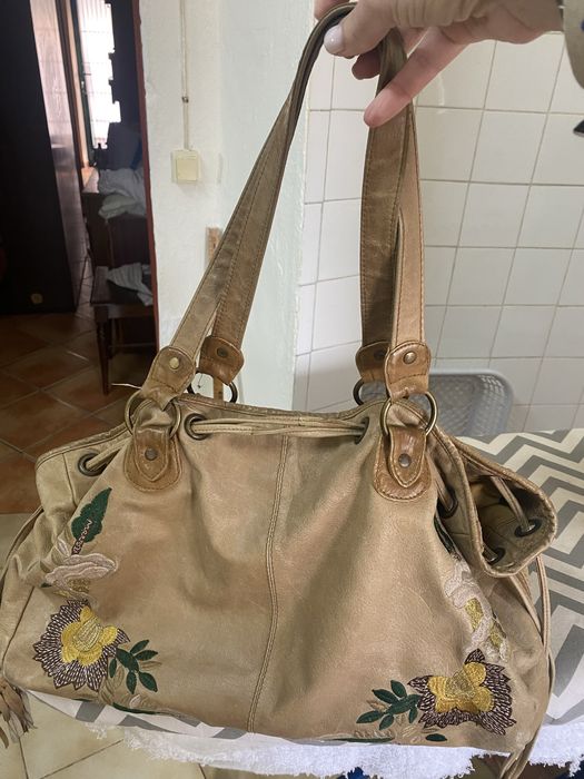 Vendo mala usada toda  em pele, da marca Throtlleman