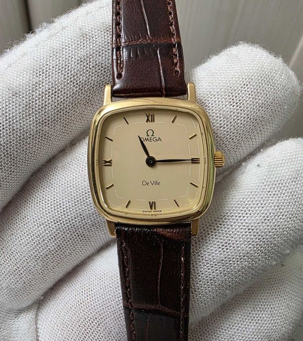 Золотий жіночий годинник Omega De Ville золото 750 пр