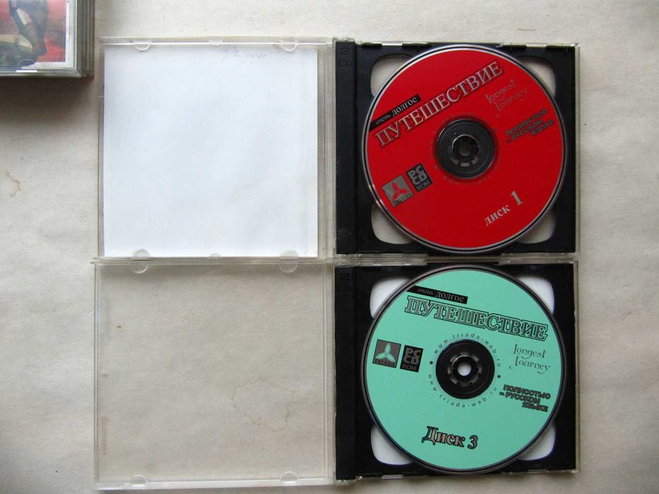 Сім колекційних CD Triada з іграми 2000-01 років