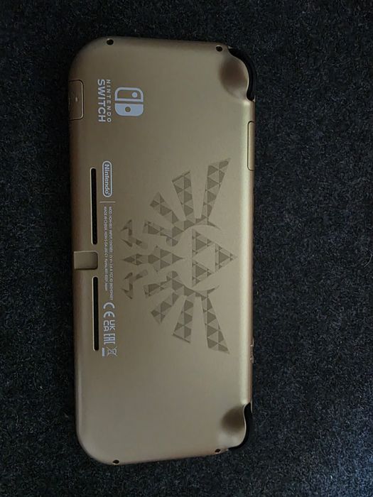 Nintendo Switch Lite - Hyrule Edition (Never Used)64729616262531122