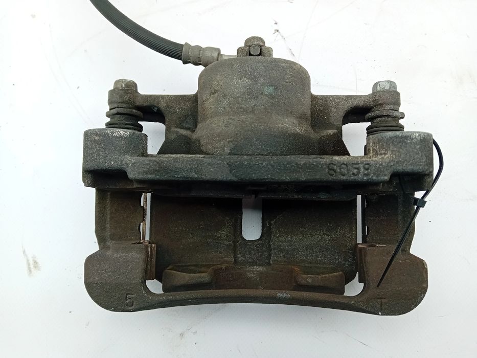 Pinça travão / maxila de travão frente esquerda NISSAN QASHQAI +2 (JJ1