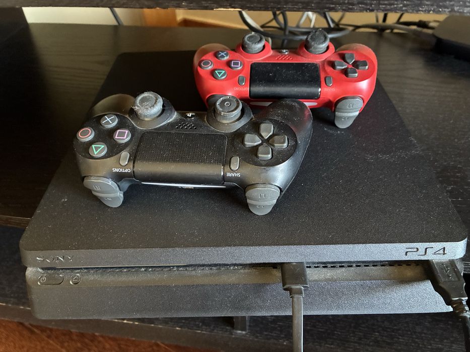 Playstation 4 + 2 comandos  + 12 jogos