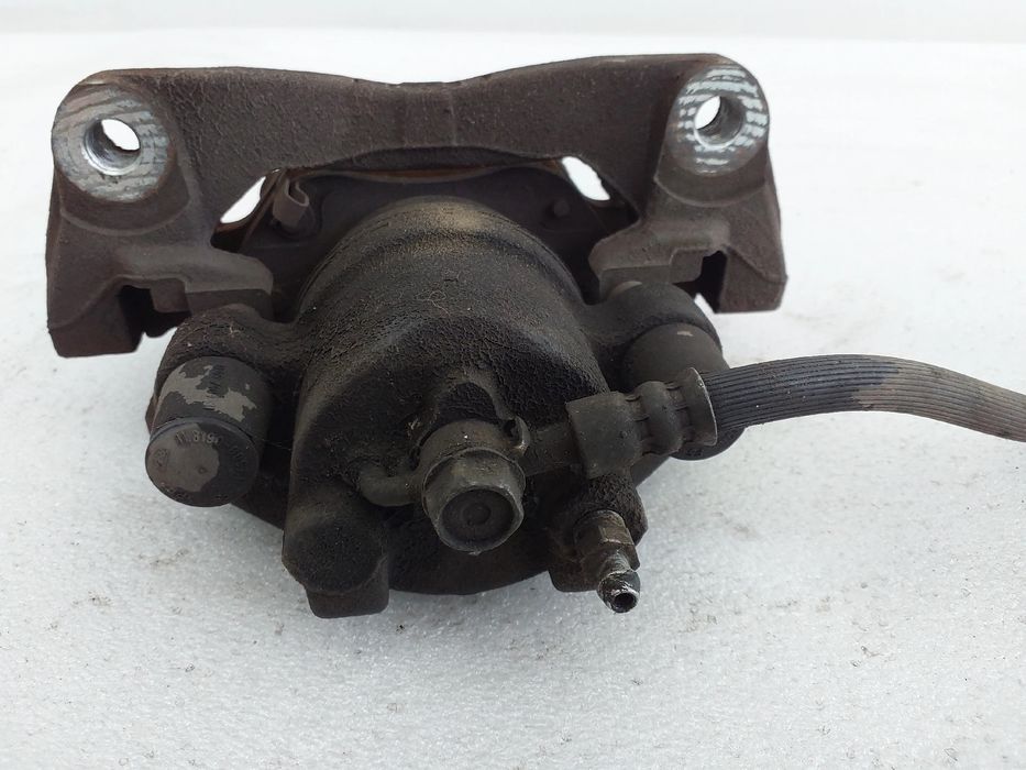 Pinça travão / maxila de travão frente esquerda TOYOTA Auris Hatchback