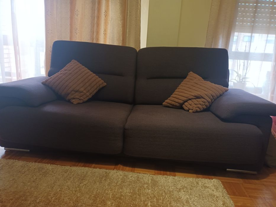 Sofá cama de três lugares