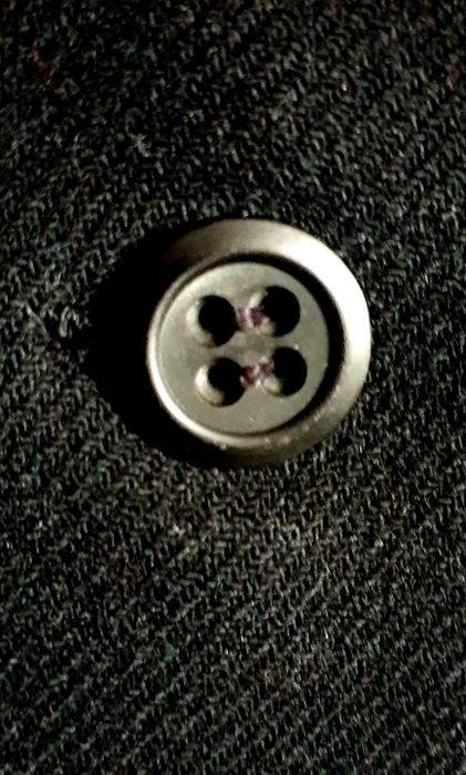 Krótki płaszcz wełniany.