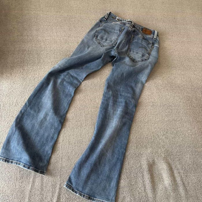 джинси кльош на низькій посадці