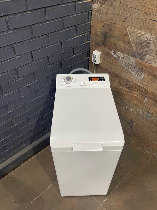 Пралка з вертикальним завантаженям Electrolux EW2T5061P Склад магазин