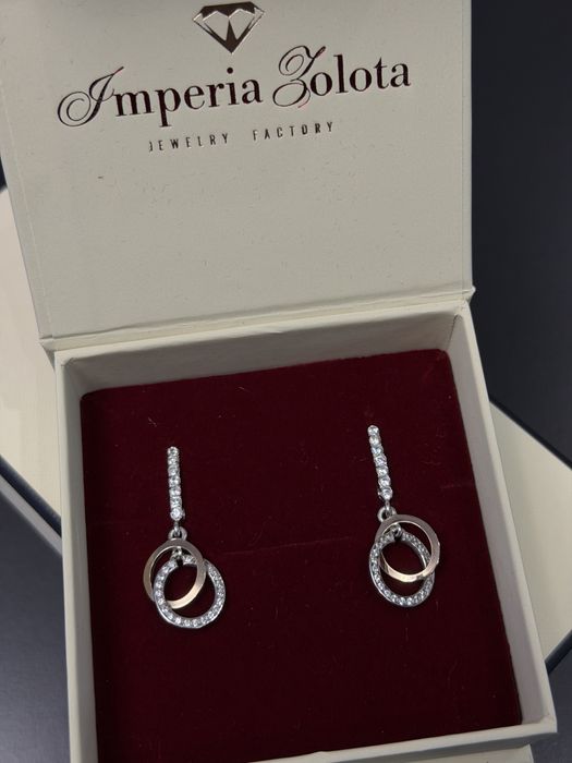 Срівбні сережки з золотими вставками та фіанітами