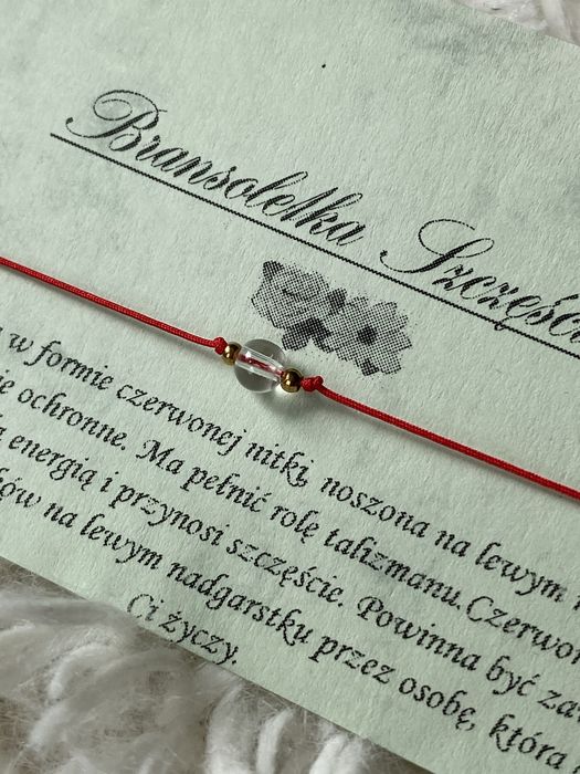 Bransoletka szczecia na czerwonym sznurku z krysztalem gorskim