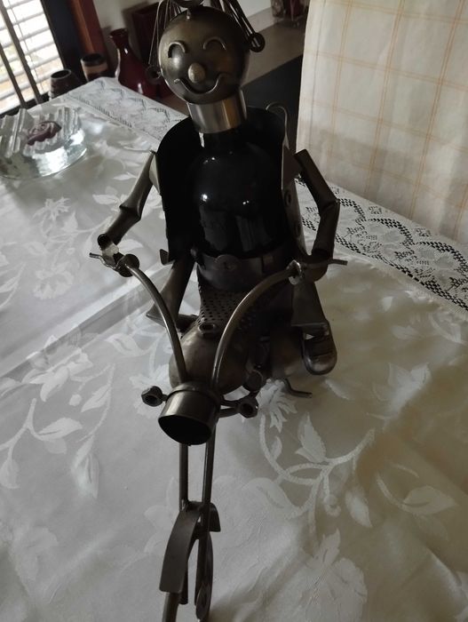 Suporte de garrafa em metal