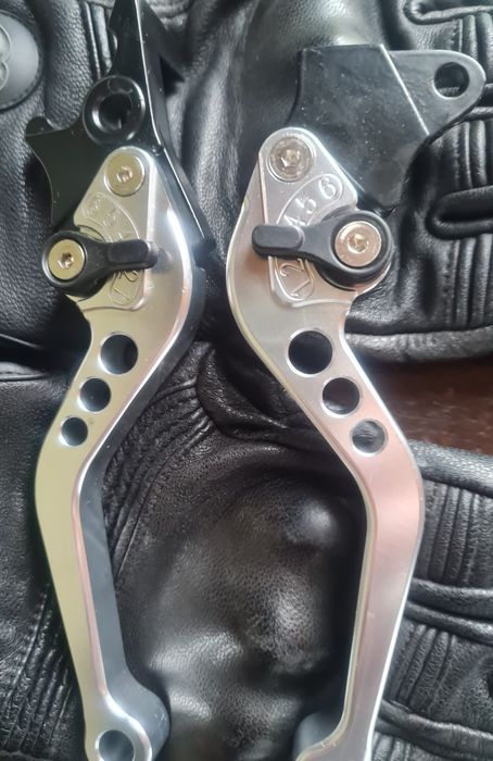 Manípulos de freio e velocidade para mota