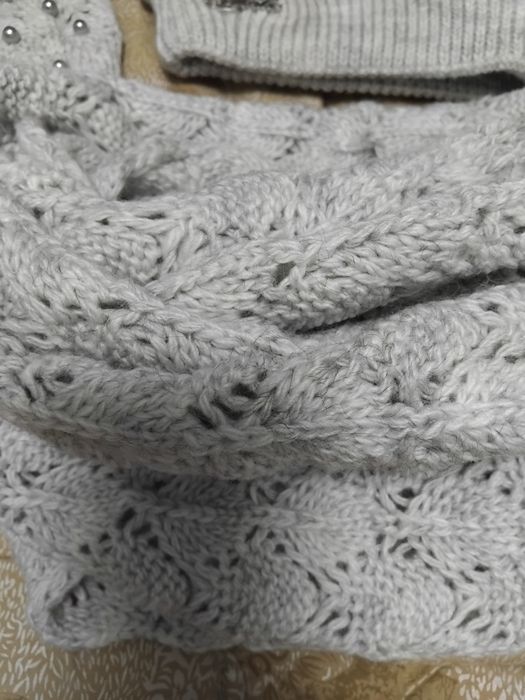 Женская вязаная шапочка