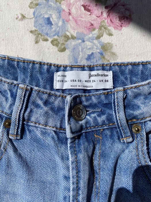 Jeansy z dziurami szerokie dzwony XS 34 stradivarius typu flare