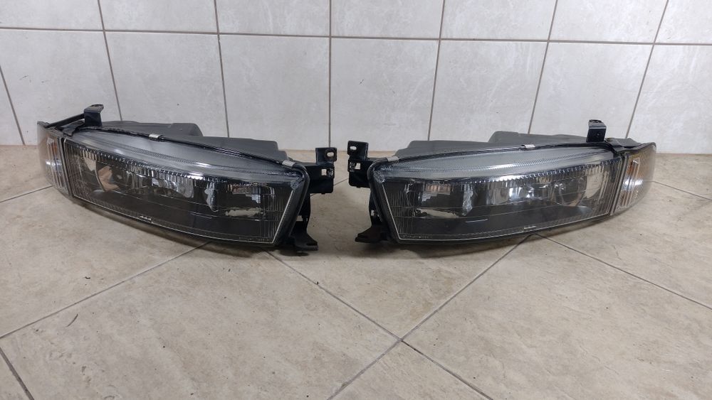 Mitsubishi Galant Europa lampa prawa lewa komplet kierunki wysyłka
