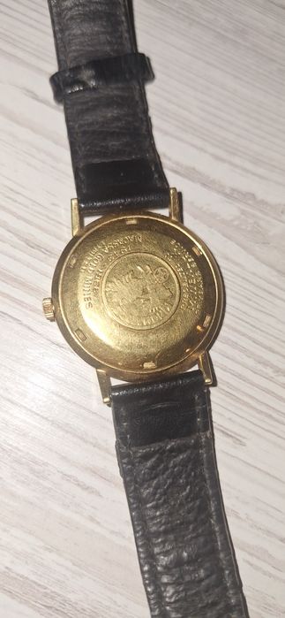 Часы Movado           .