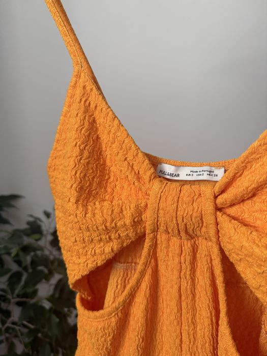 Kombinezon pomarańczowy Pull&Bear