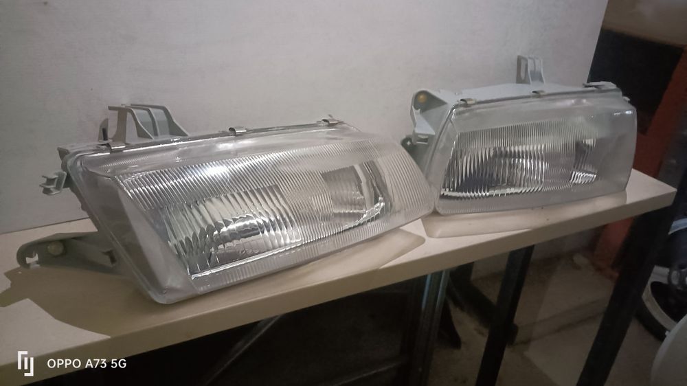 Farol Mazda 323 ótica nova óptica 1994