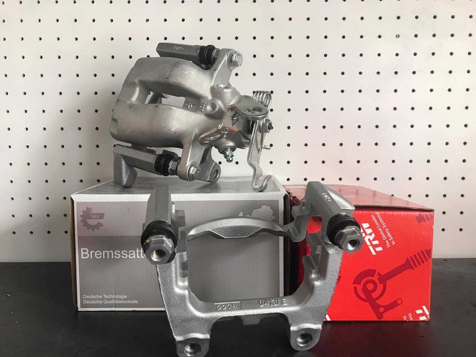 Zestaw Tył 310mm zaciski jarzma VW passat B6 CC B7 Elektryczny