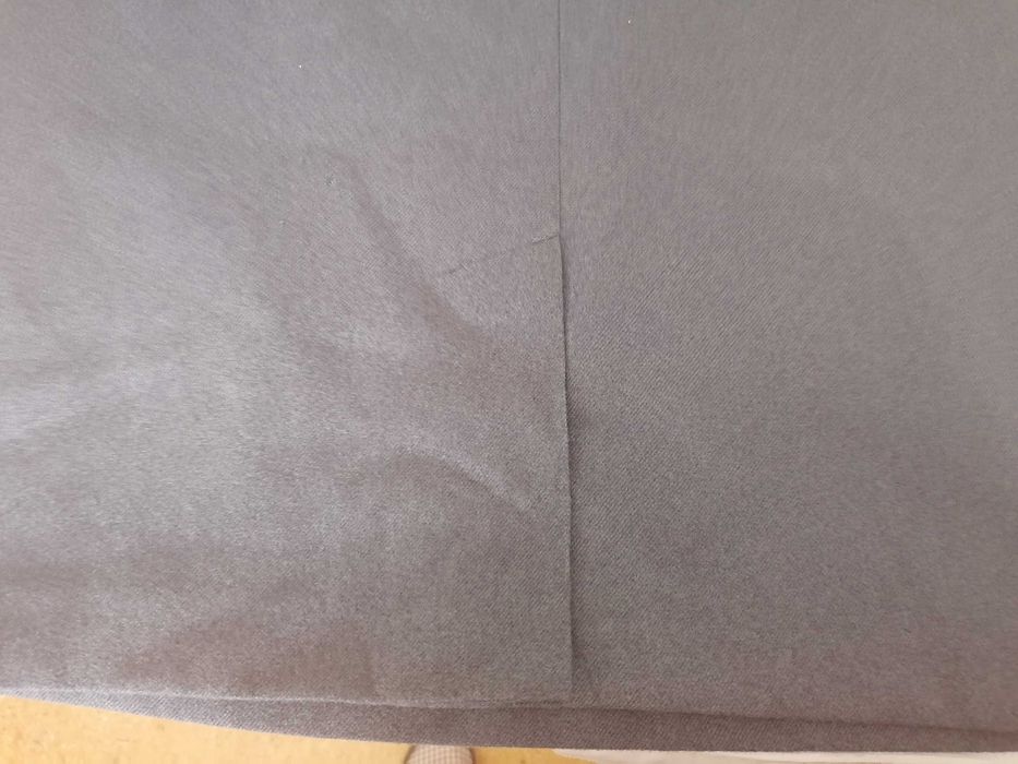 Gray 100% polyester skirt, size 38 with back slit, new64585869779075122