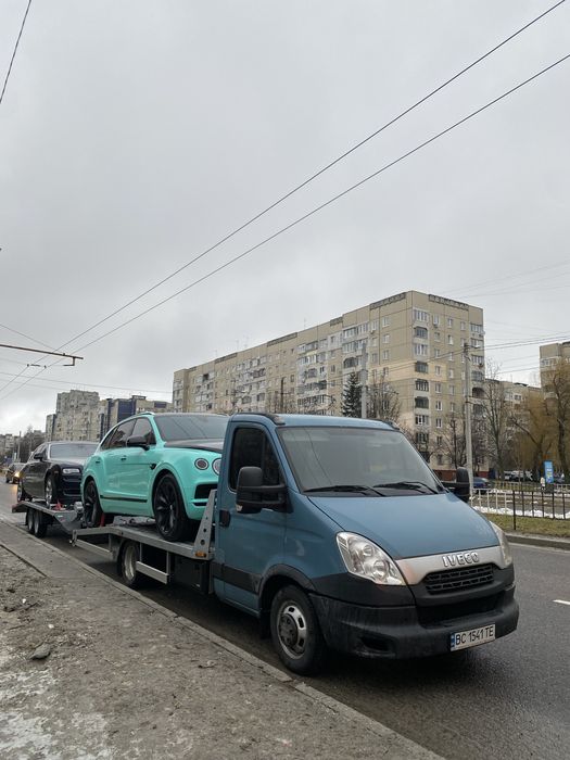 Евакуатор маніпулятор гідроплатформа Перевезення по Львову, Україні,эвакуатор Gold evakuator