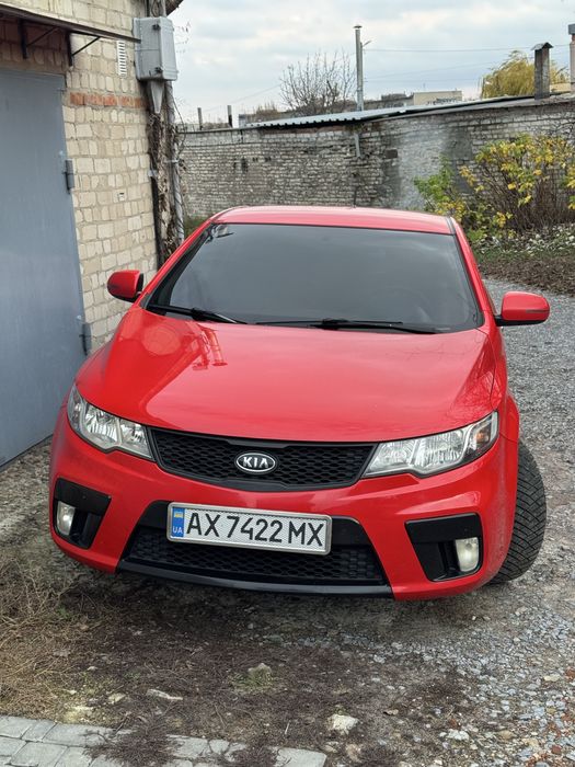 Автомобиль KIA Cerato купе .