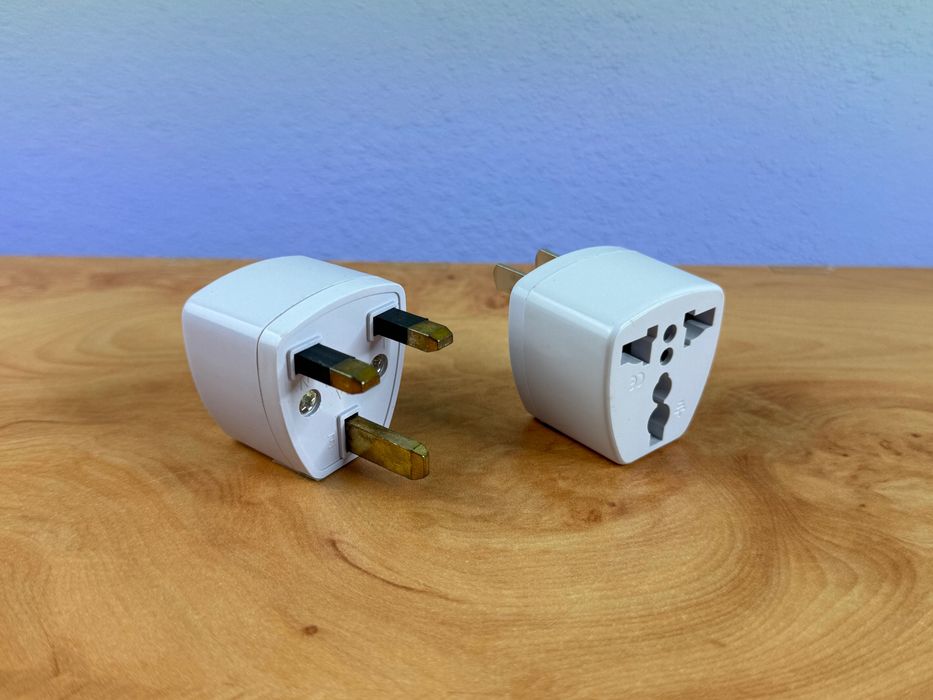 Adaptador Conversor p/ tomada Plug US / EU / UK **novo**64752248292866121
