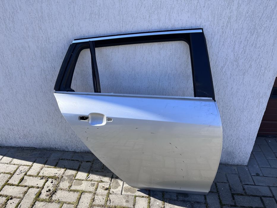 Drzwi prawe tylne Opel Insignia A kombi prawy tył