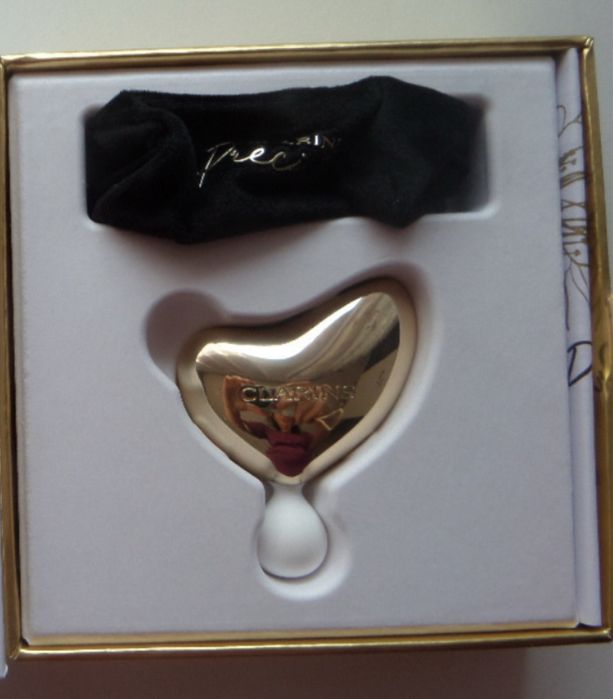 Masazer clarins precious