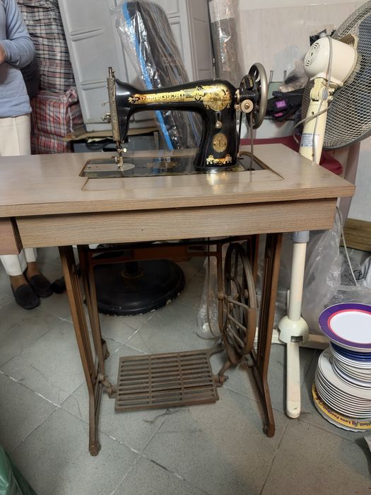 Máquina de costura singer