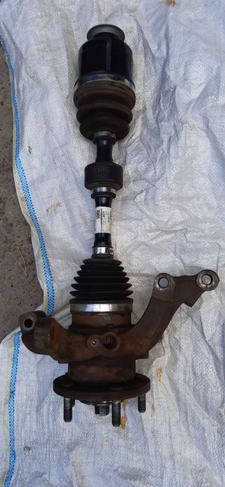 Полуось, ступица с поворотным кулаком правая в сборе KIA Sportage б/у