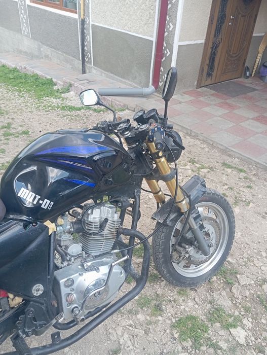 Мотоцикл         .