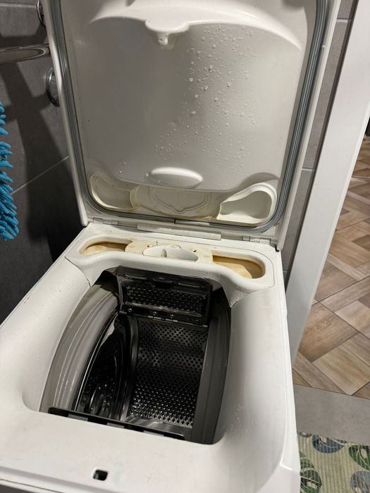 Zanussi ZWQ5102 вертикальна загрузка