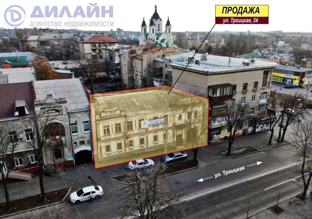 Здание в центре г. Запорожье. Рядом –  пр. Соборный