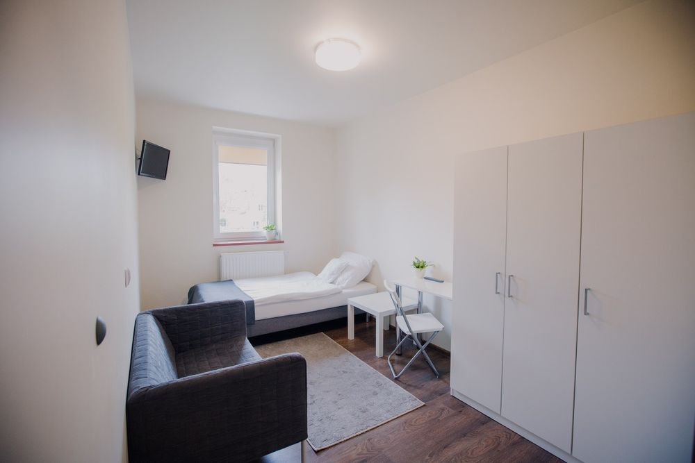 W centrum pokoje i mieszkania - noclegi + parking na posesji