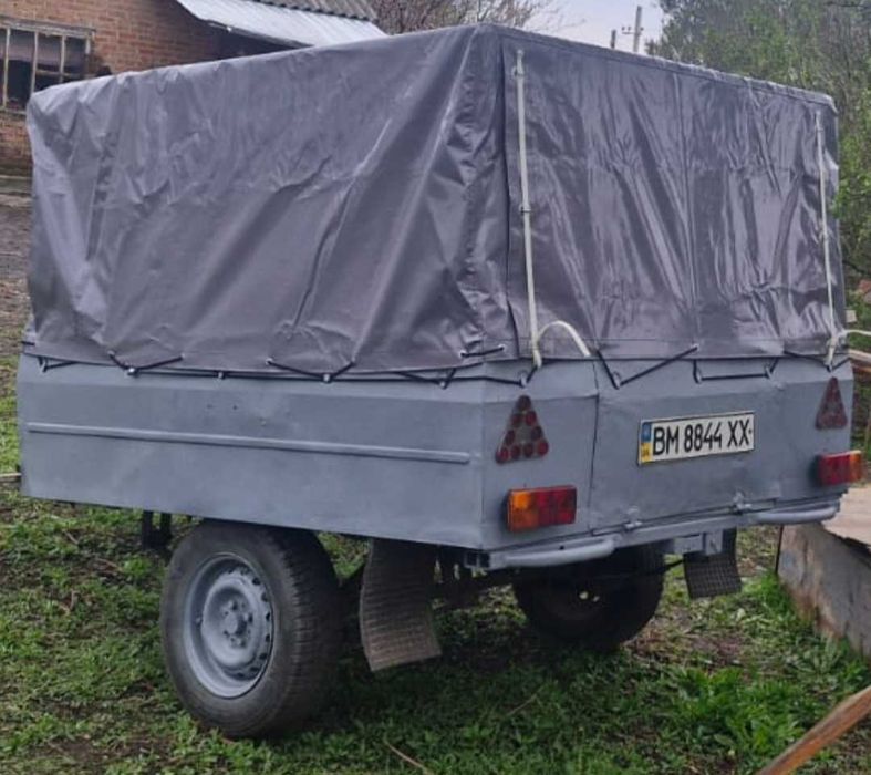 Продам причеп в гарному стані з тентом.знаходиться лозова павдоград
