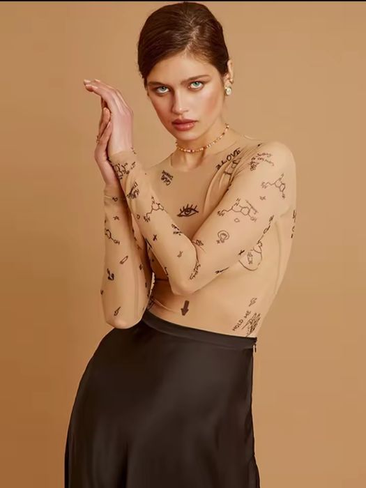 Облягаючий боді на довгий рукав