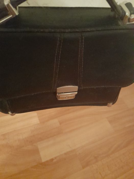 Шкіряні чоловічі сумки/клатчі