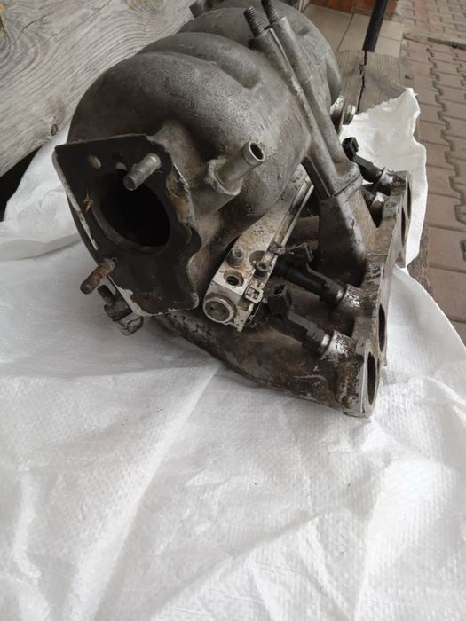 Колектор впускний ваз 2123 2107 2104