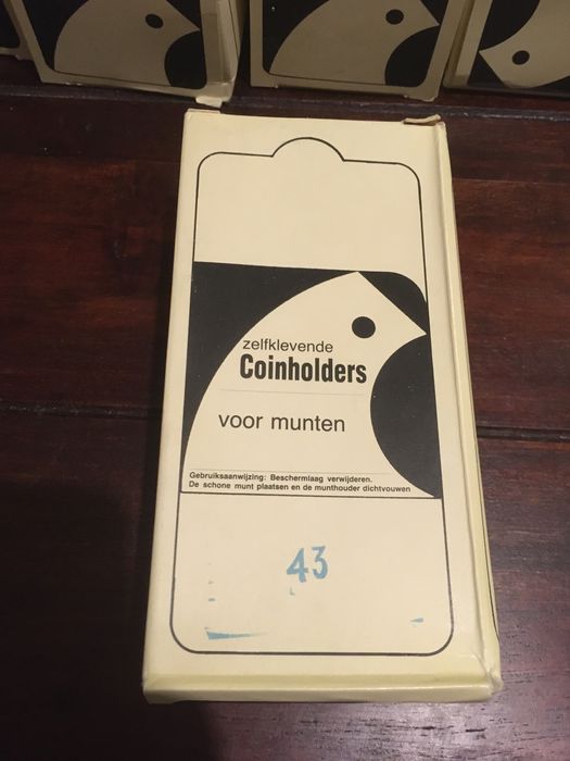 Zestaw 10 pudełek po 50 duzych (64mm) holderów na monety 43mm