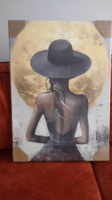 Obraz na płótnie "pani w kapeluszu i czarnej sukience"